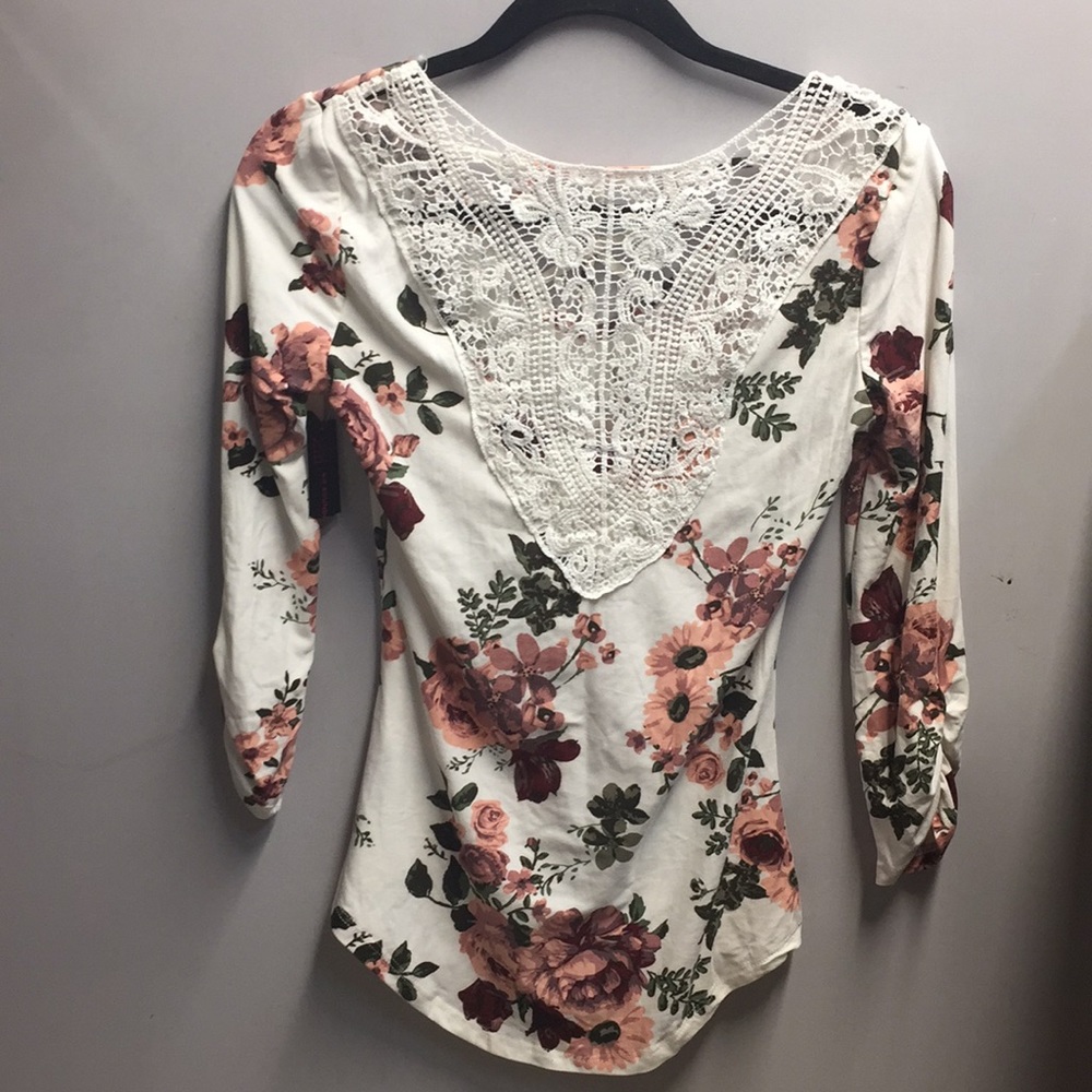 White floral blouse.